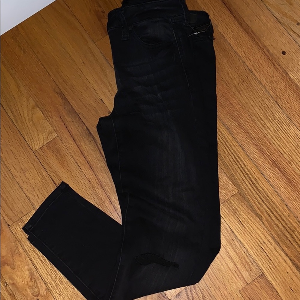 Ripped knee jeans